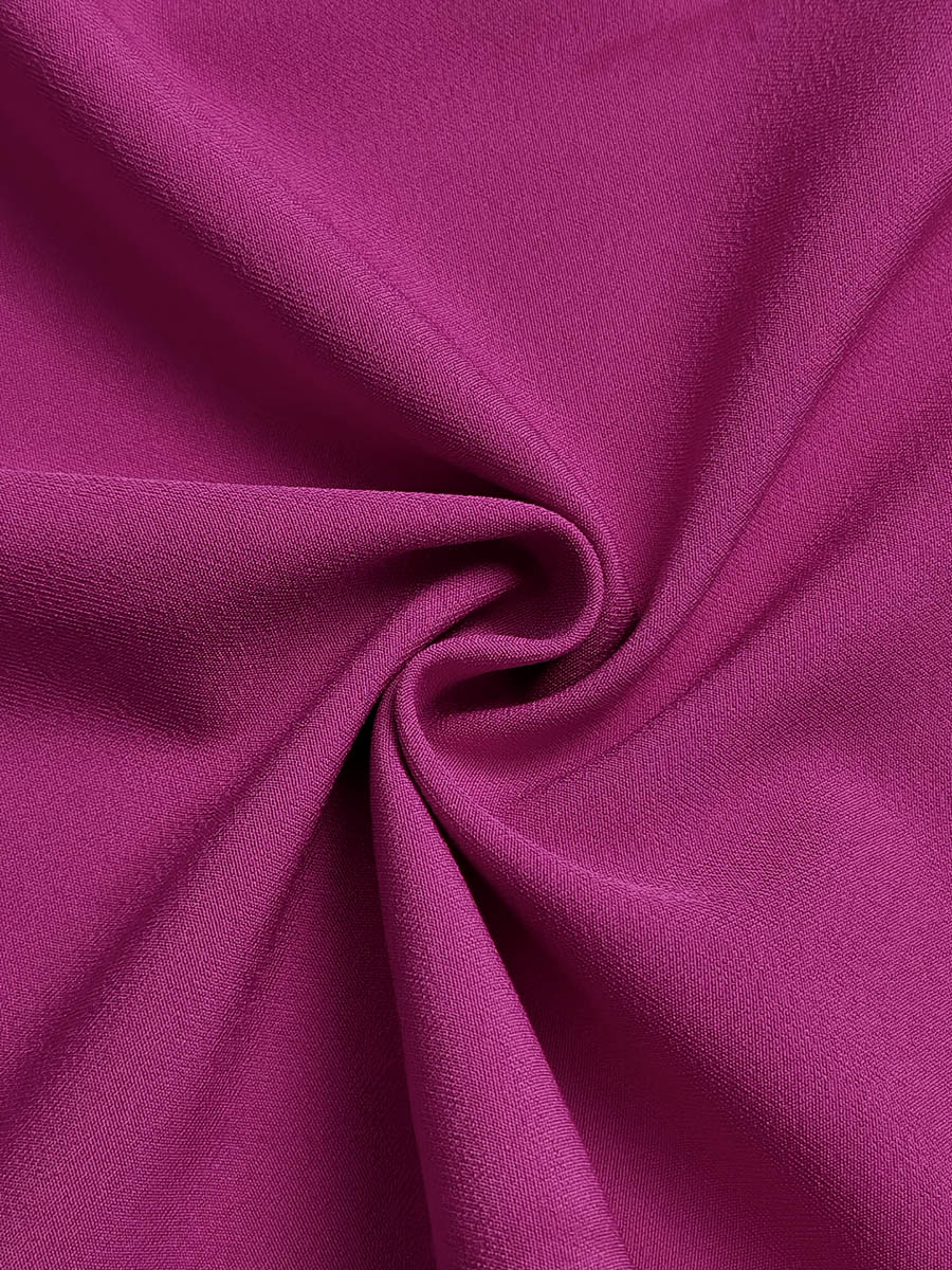 Robe longue ample plissée à manches longues, à empiècements, à volants étagés, à col rond, couleur unie