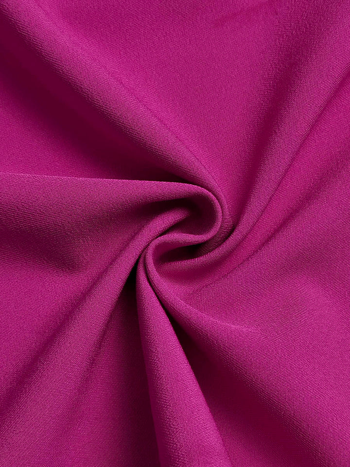 Robe longue ample plissée à manches longues, à empiècements, à volants étagés, à col rond, couleur unie