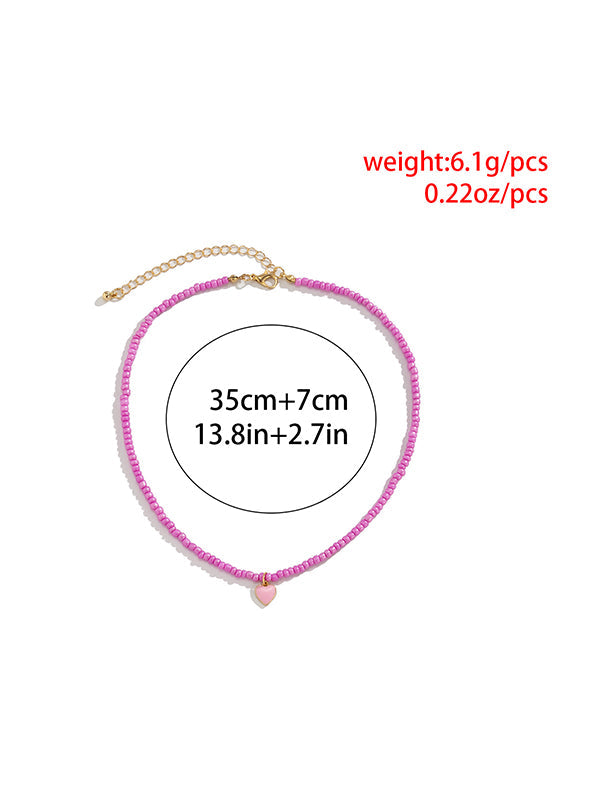 Collier à perles, couleur unie