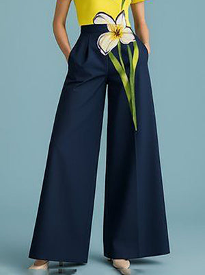 Pantalon ample plissé à jambes larges