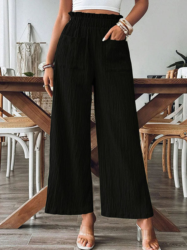 Pantalon ample plissé à jambes larges, à taille élastique, à poches, à empiècements, couleur unie
