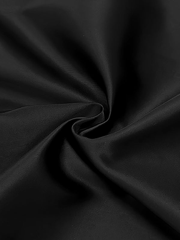 Robe mi-longue boutonnée à manches longues, à manches bouffantes, à décolleté en V profond, couleur unie