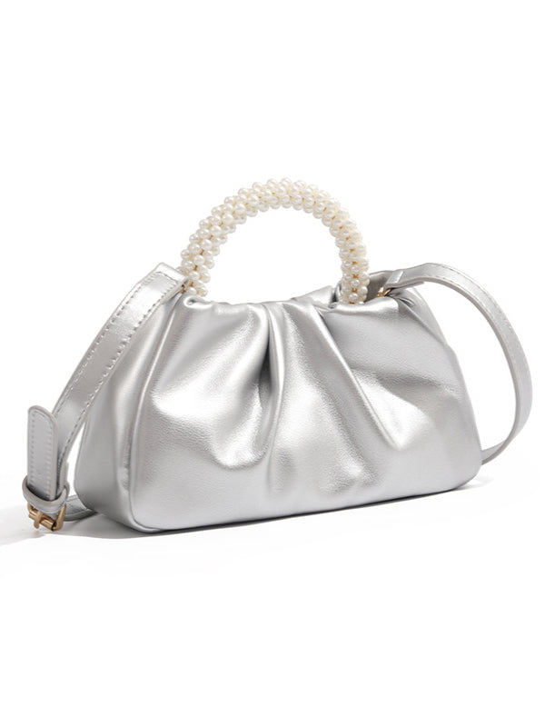Sac à main perlé à empiècements