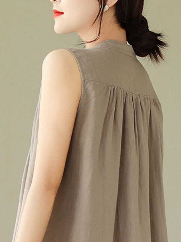 Robe mi-longue boutonnée plissée coupe trapèze, sans manches, à col rond, couleur unie