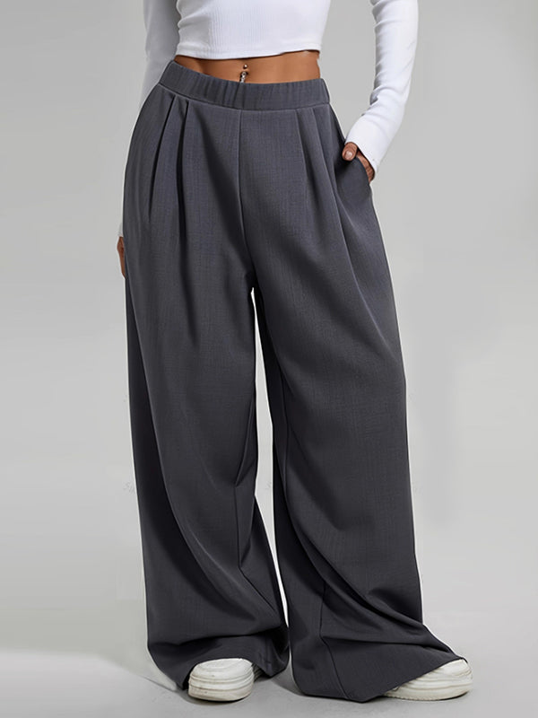 Pantalon ample plissé taille haute, à poches, couleur unie