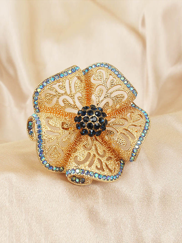 Bague réglable ajourée en forme de fleur, à strass