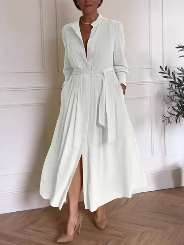 Robe longue boutonnée plissée coupe trapèze, à manches longues, à poches, à taille nouée, à col en V, couleur unie