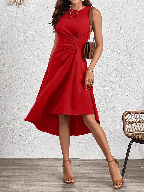 Robe mi-longue asymétrique plissée coupe trapèze, taille haute, à empiècements, à col rond, couleur unie