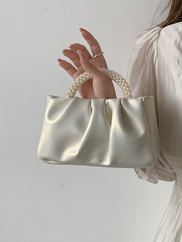 Sac à main perlé à empiècements