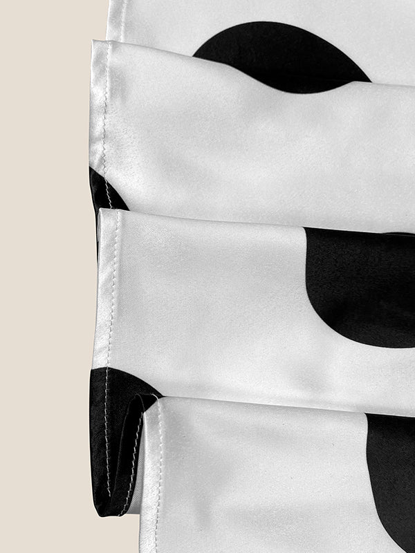 Robe chemise coupe trapèze, sans manches, à pois, à empiècements, à taille nouée, à col revers