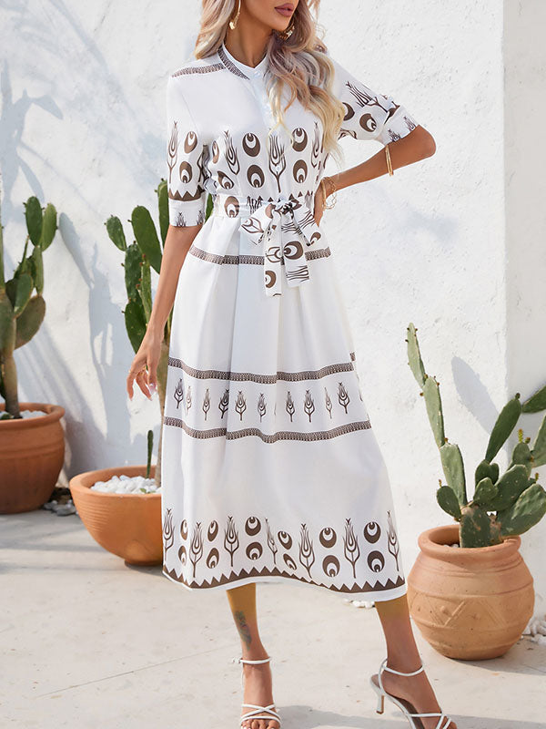 Robe mi-longue boutonnée coupe trapèze, à manches mi-longues, à taille nouée, à col revers