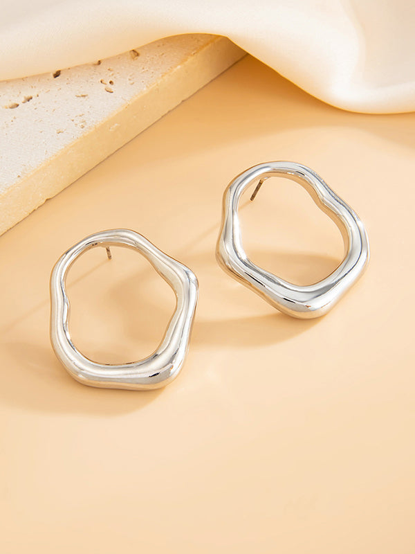 Boucles d'oreilles brillantes à coupe irrégulière