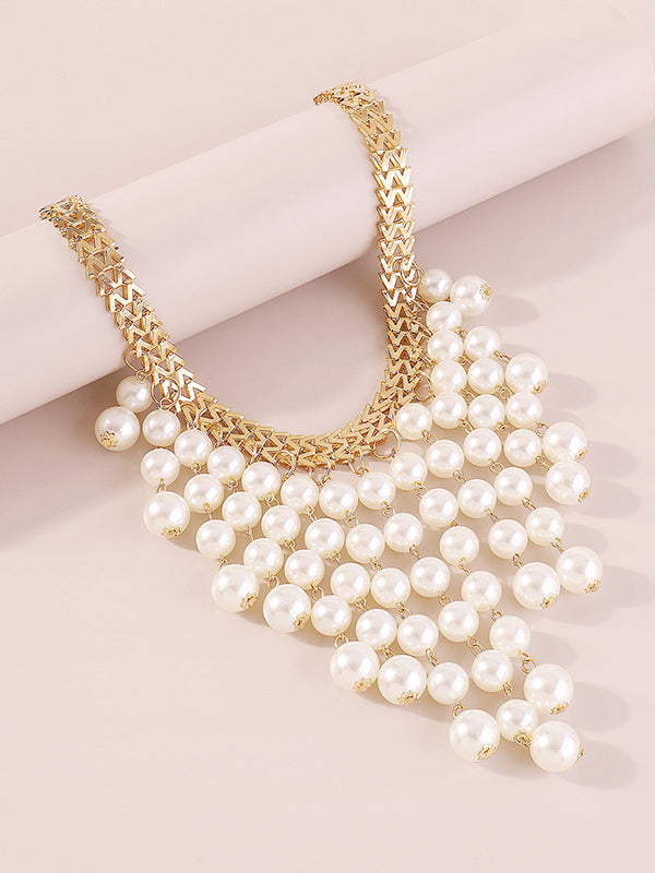 Collier perlé délicat à pompons
