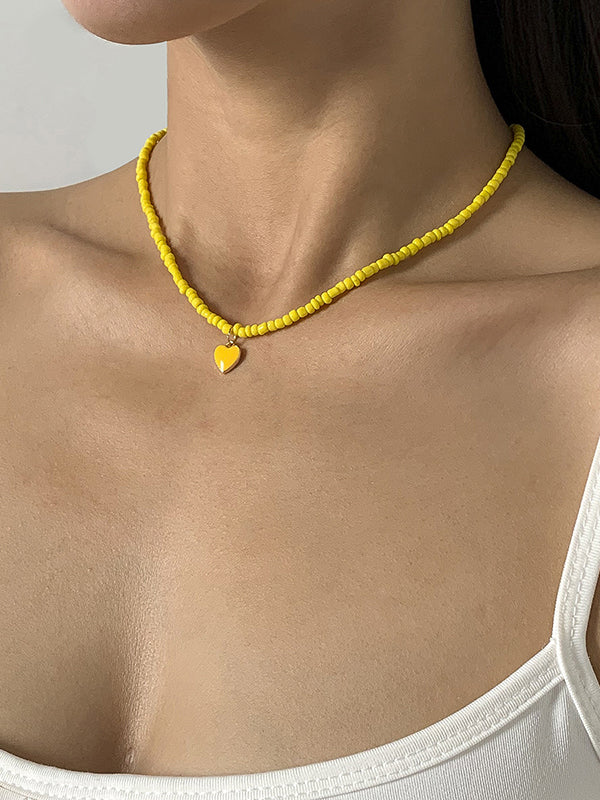 Collier à perles, couleur unie