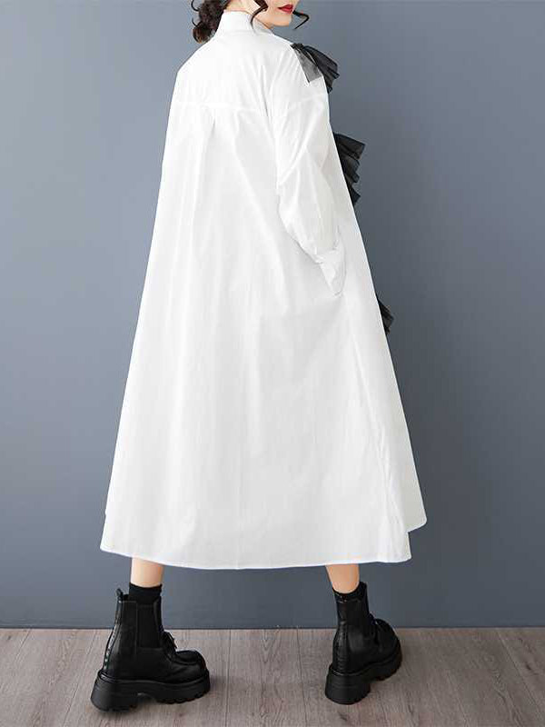 Robe chemise boutonnée coupe trapèze, à manches longues, à empiècements, à col revers