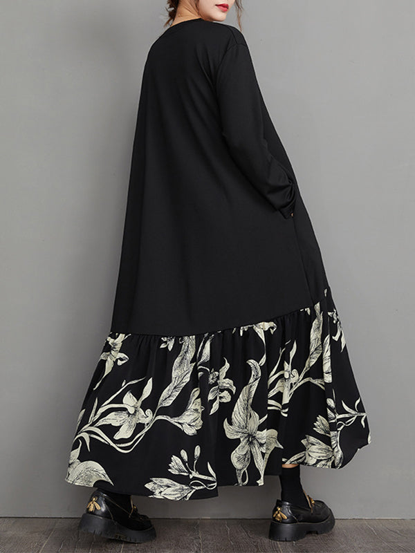 Robe mi-longue asymétrique coupe trapèze, à ourlet plongeant, à imprimé floral, à empiècements, à col en V