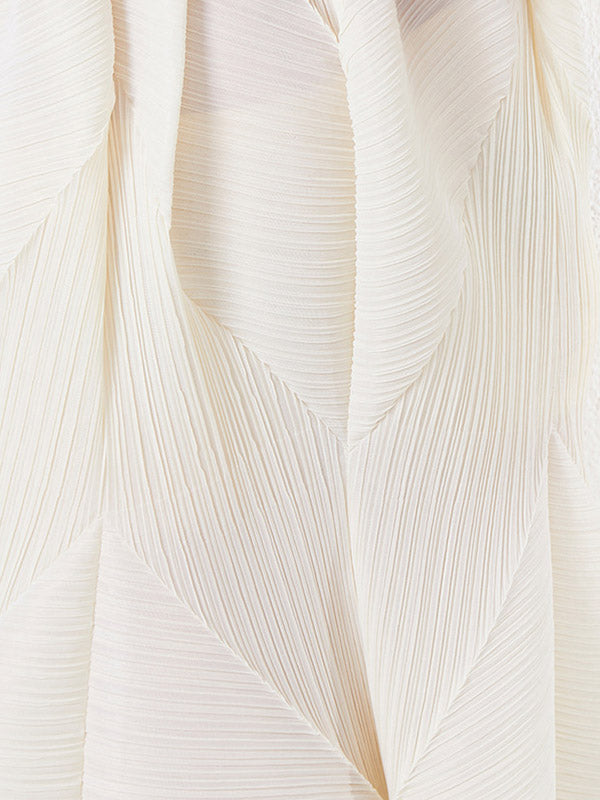 Robe mi-longue ample plissée taille haute, à col rond, couleur unie