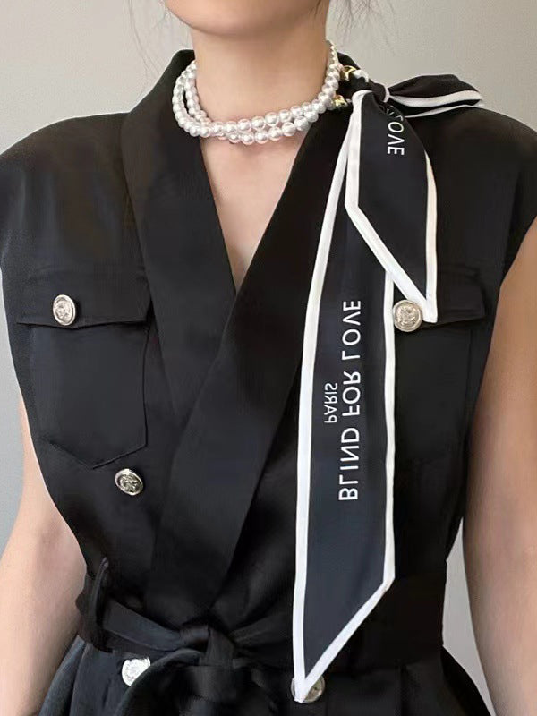 Collier perlé délicat à imprimé lettres