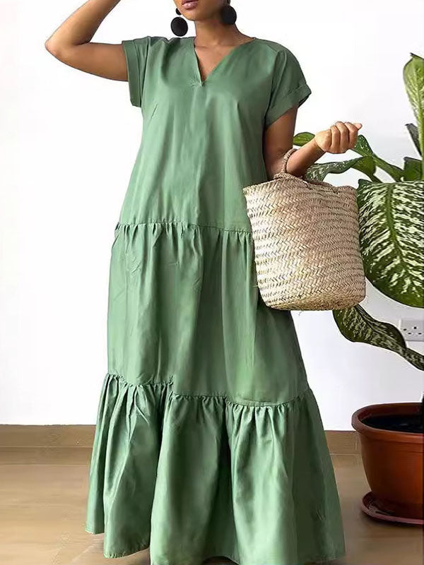 Robe longue ample plissée coupe trapèze, à empiècements, à col en V, couleur unie