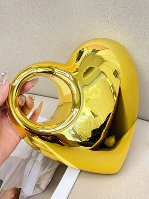 Sac à main brillant en forme de cœur