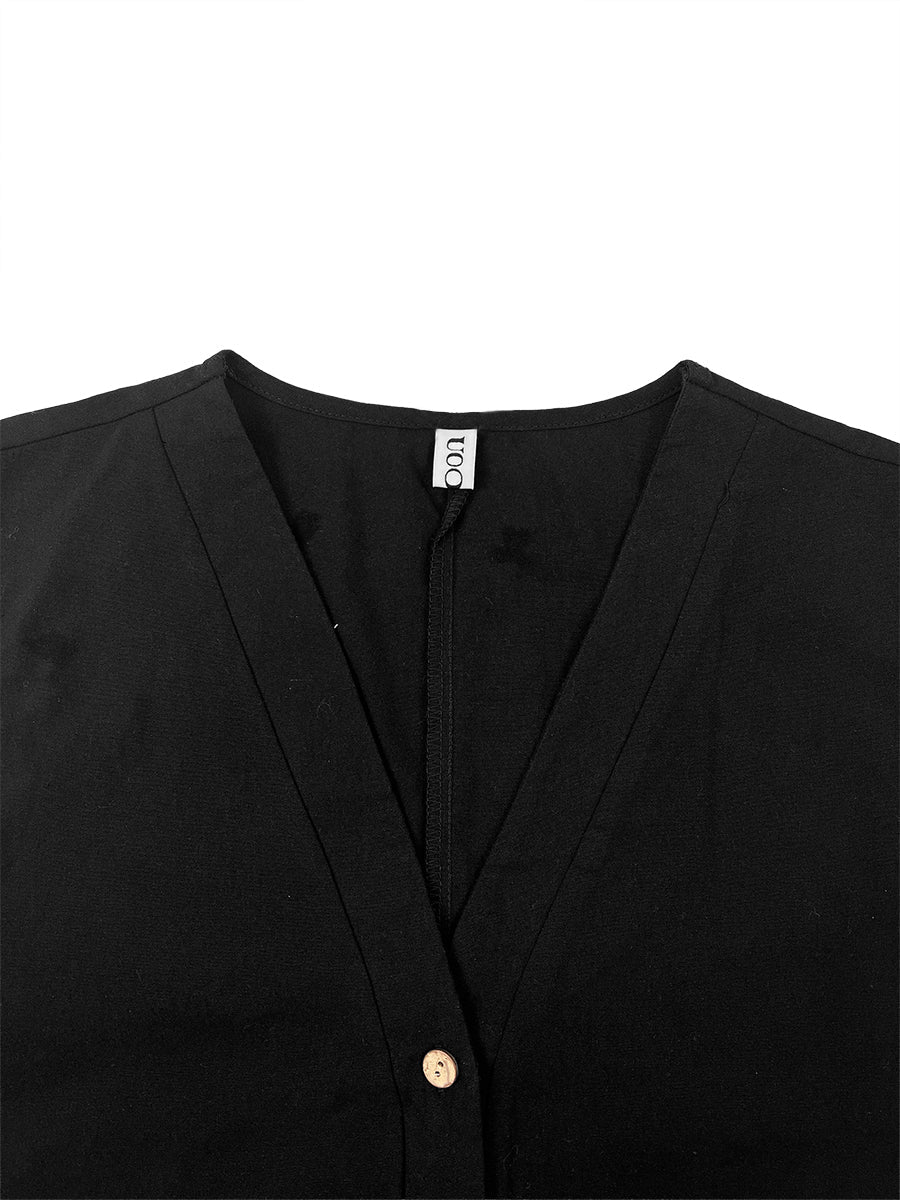 Combinaison boutonnée sans manches, à jambes larges, à col en V, couleur unie