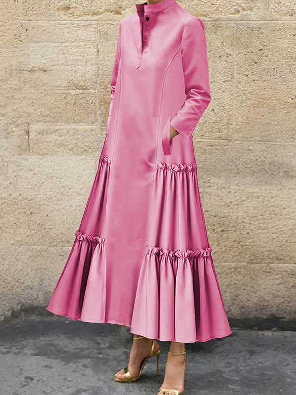 Robe longue boutonnée superposée plissée volantée coupe trapèze, à manches longues, à poches, à empiècements, à col montant, couleur unie