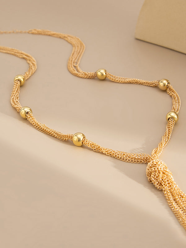 Collier à pompons