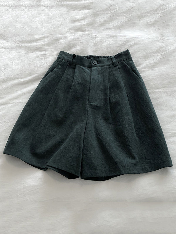 Short ample plissé à jambes larges, à taille élastique, couleur unie
