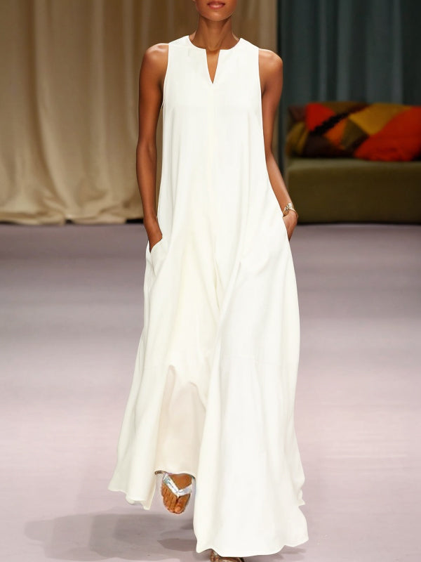 Robe longue ample sans manches, à empiècements, à col rond, couleur unie