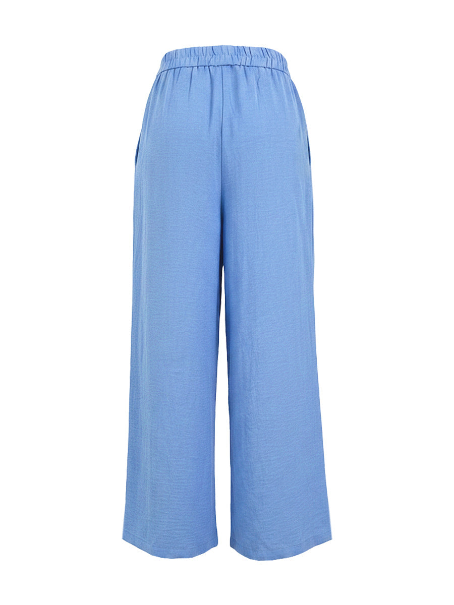 Pantalon ample boutonné à jambes larges, à poches, couleur unie