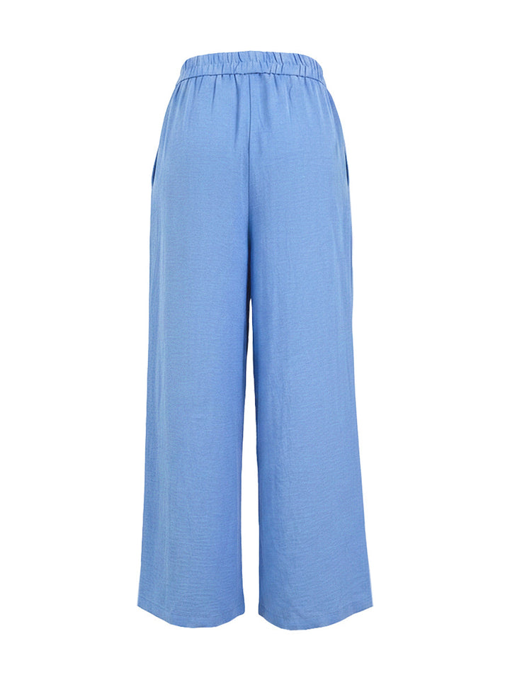 Pantalon ample boutonné à jambes larges, à poches, couleur unie