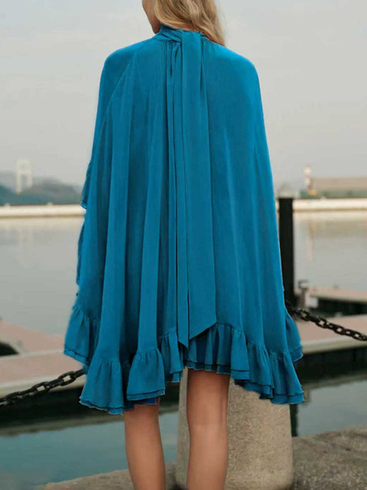 Robe courte ensemble deux pièces plissée volantée nouée taille haute, sans manches, à empiècements, à col cheminée, couleur unie