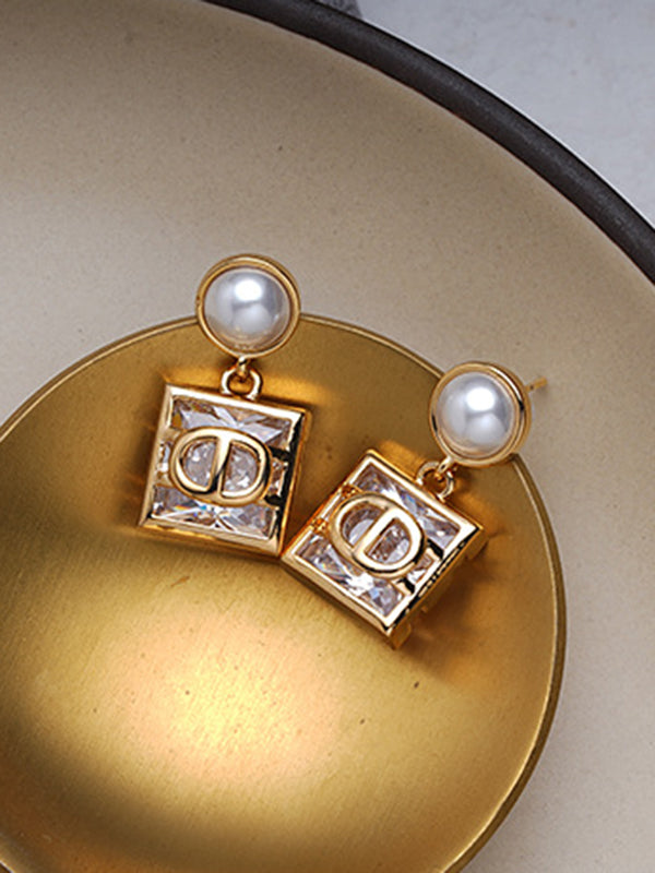 Boucles d'oreilles géométriques couleur contrastée