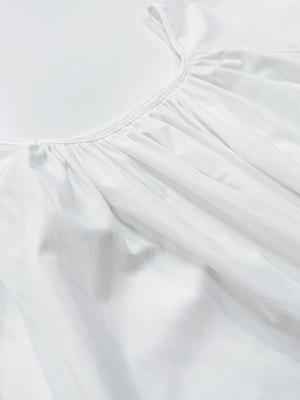 Robe longue ample plissée à manches évasées, à empiècements, à col rond, couleur unie