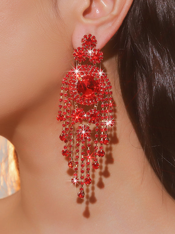 Boucles d'oreilles pendantes géométriques à pompons