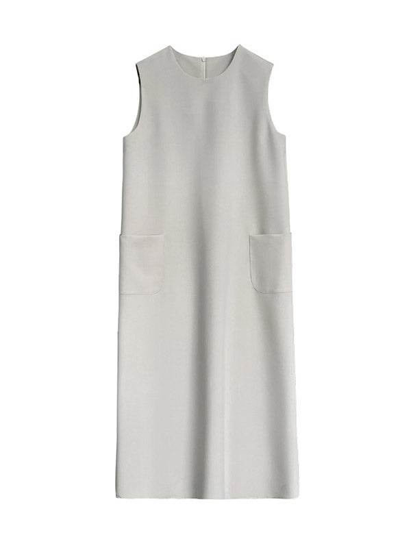Robe mi-longue ample fendue dans le dos taille haute, à poches, à fermeture éclair, à col rond, couleur unie