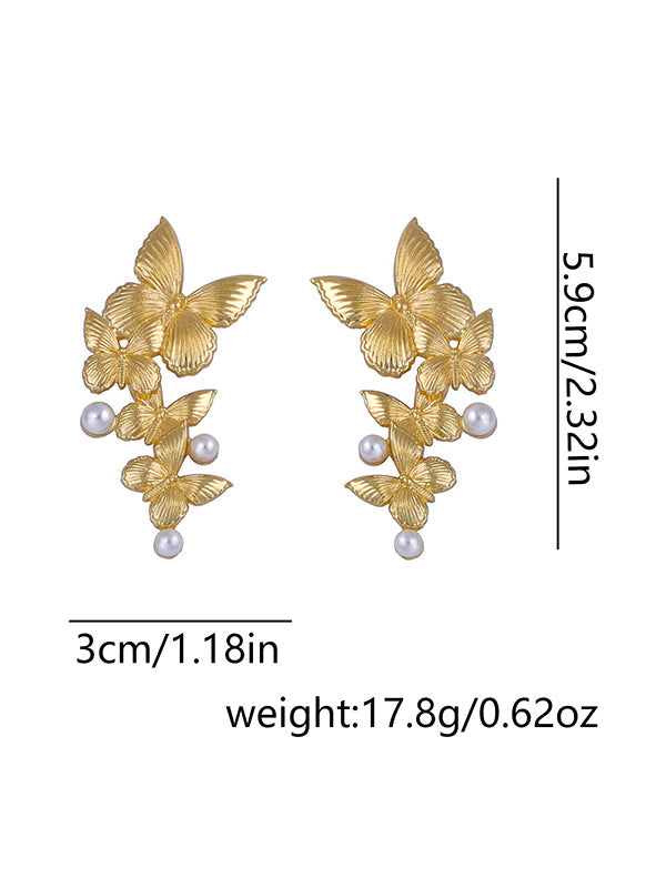 Boucles d'oreilles brillantes en forme de papillon