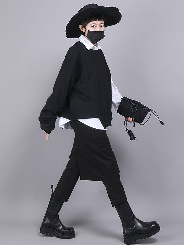Jupe-culotte noire asymétrique taille empire, effet deux pièces