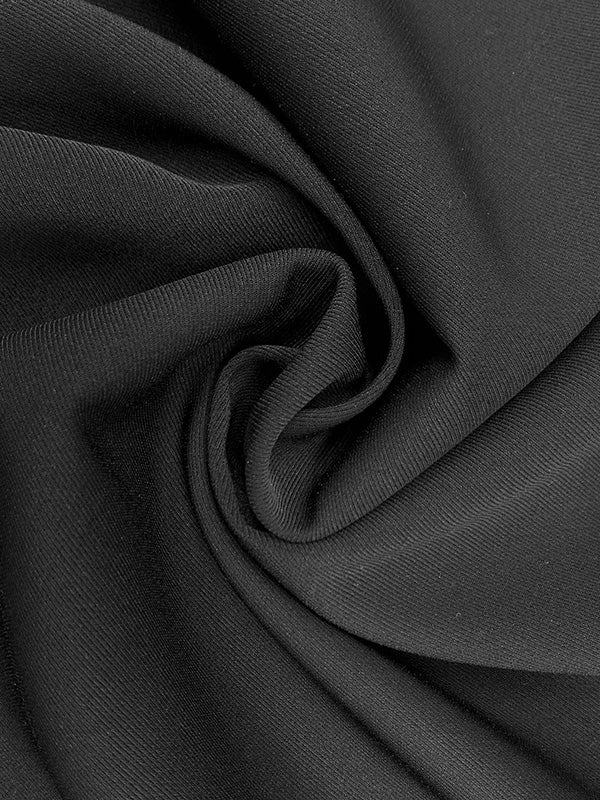 Robe courte ample ajourée à manches longues, à empiècements, à col rond, couleur unie