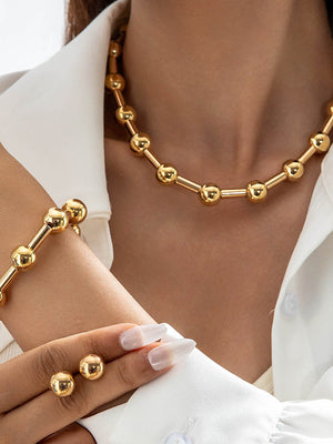 Parure collier et boucles d'oreilles géométrique couleur unie