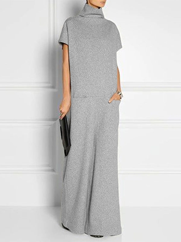 Robe longue ample à manches courtes, à empiècements, à col haut, couleur unie