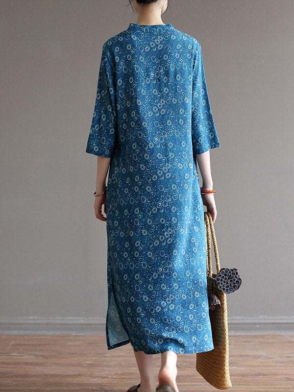 Robe mi-longue originale à col montant et motif floral uni