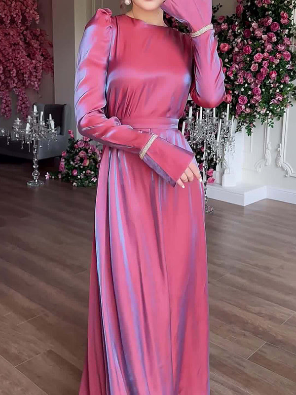 Robe longue plissée coupe trapèze, à manches longues, à taille nouée, à fermeture éclair, à col rond, couleur unie