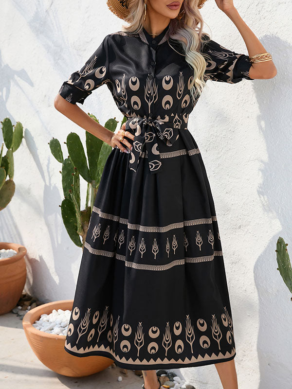 Robe mi-longue boutonnée coupe trapèze, à manches mi-longues, à taille nouée, à col revers