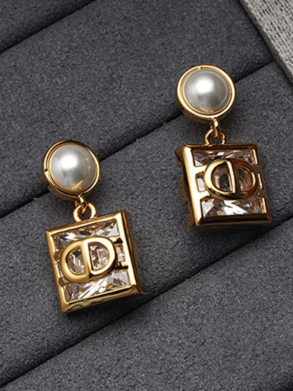 Boucles d'oreilles géométriques couleur contrastée