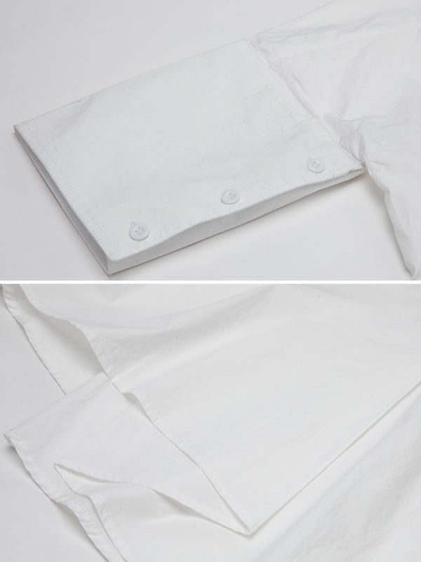 Blouse unie à coupe irrégulière et col revers