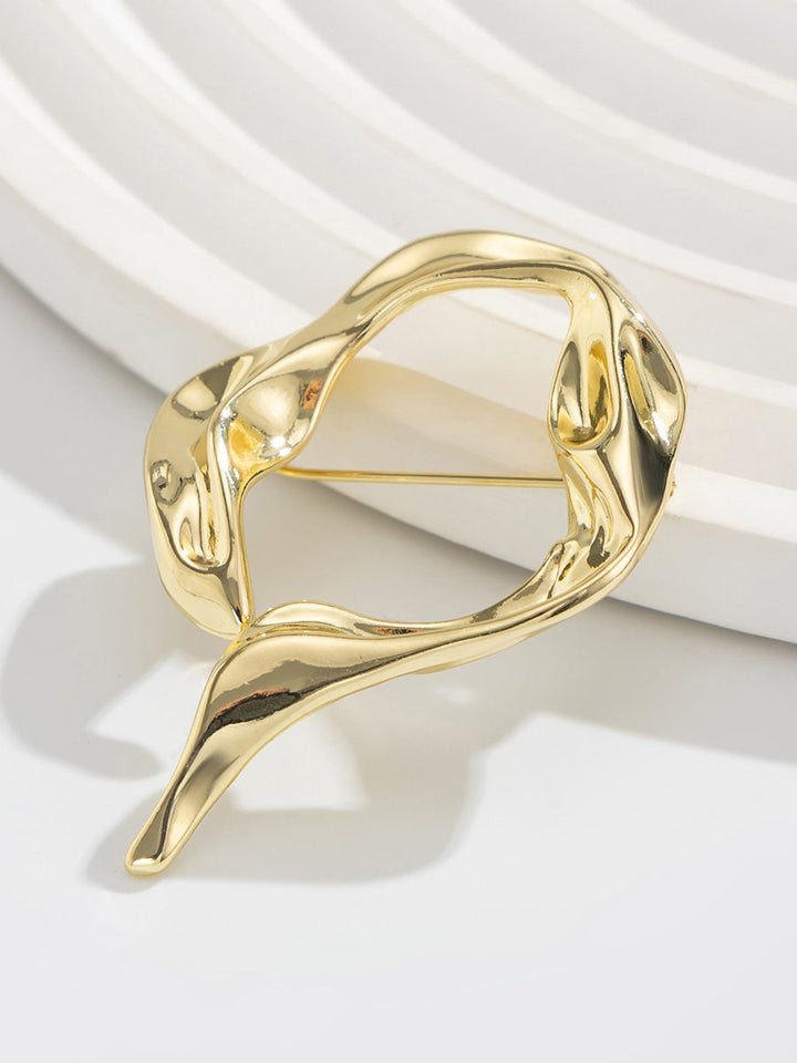 Broche à coupe irrégulière