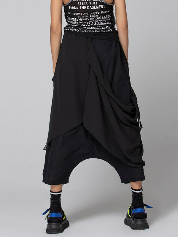Pantalon 7/8 ample plissé couleur unie