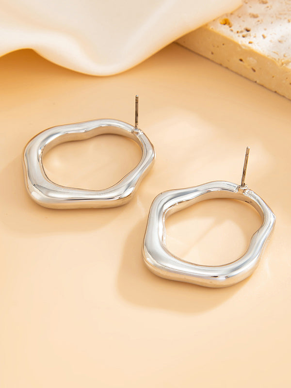 Boucles d'oreilles brillantes à coupe irrégulière