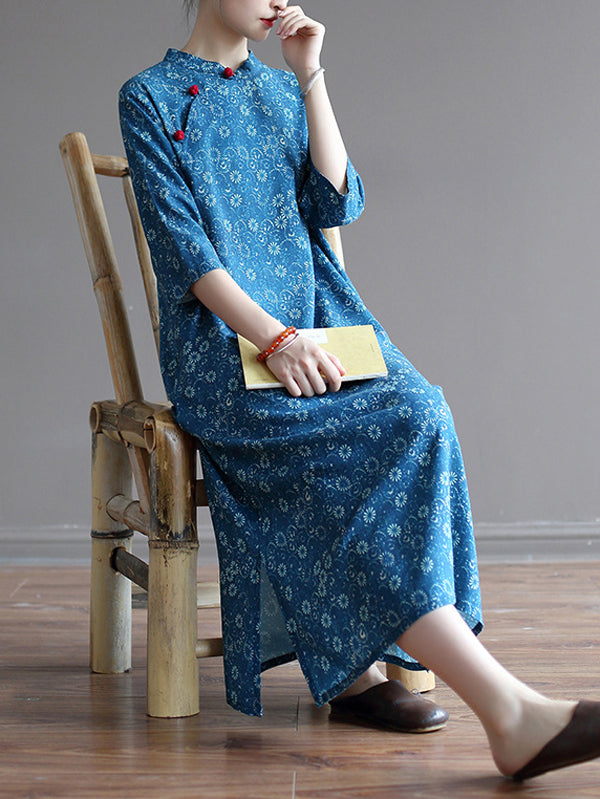 Robe mi-longue originale à col montant et motif floral uni